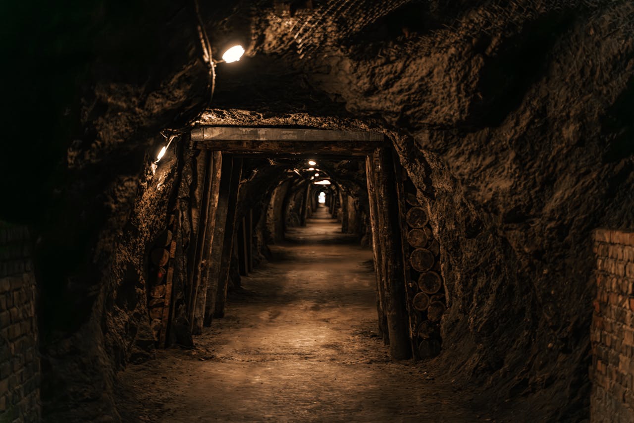 A dimly lit tunnel in Hinterbrühl, Austria, showcasing an underground cavern.